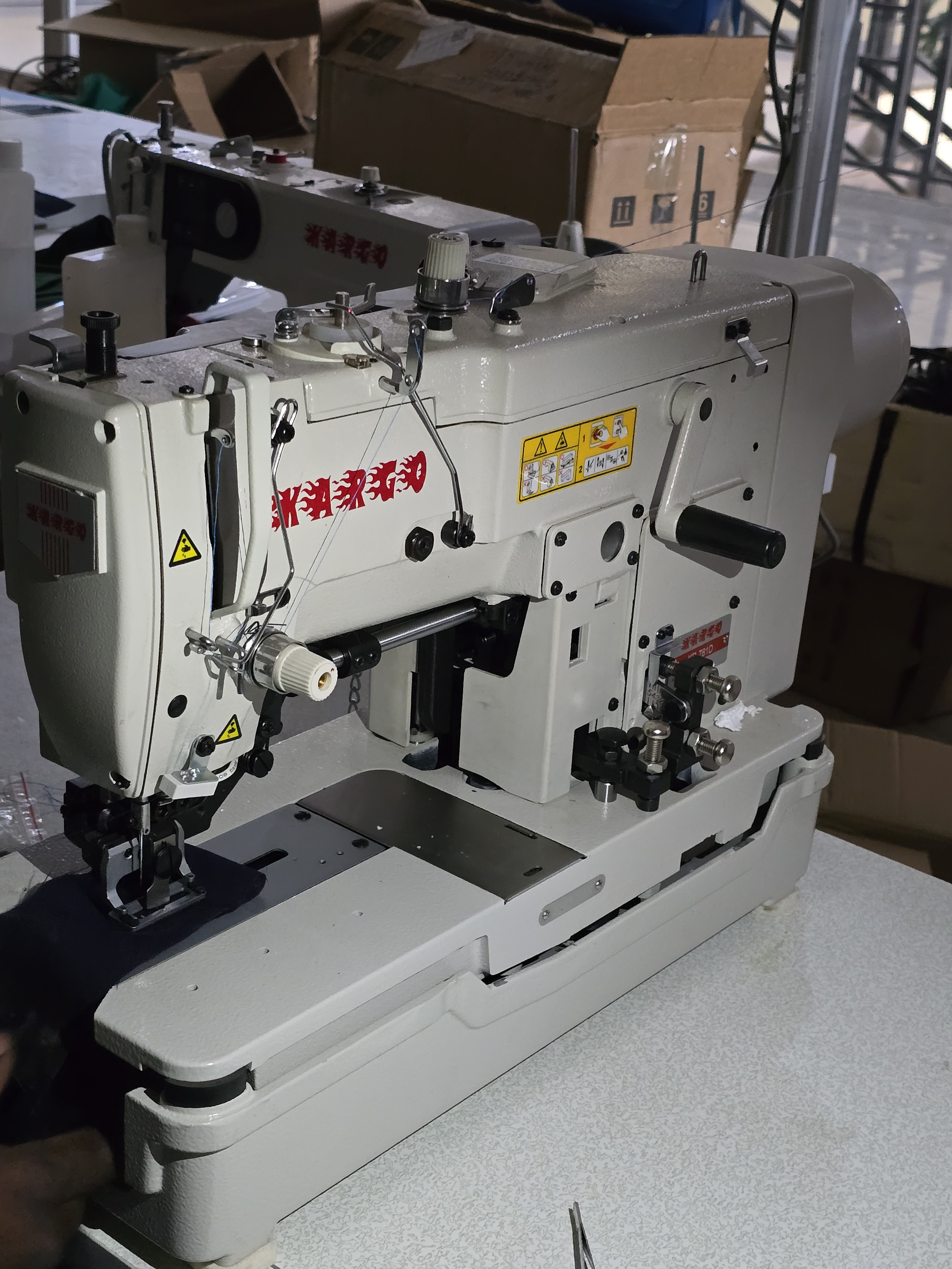 Close view of garment stitching machinery